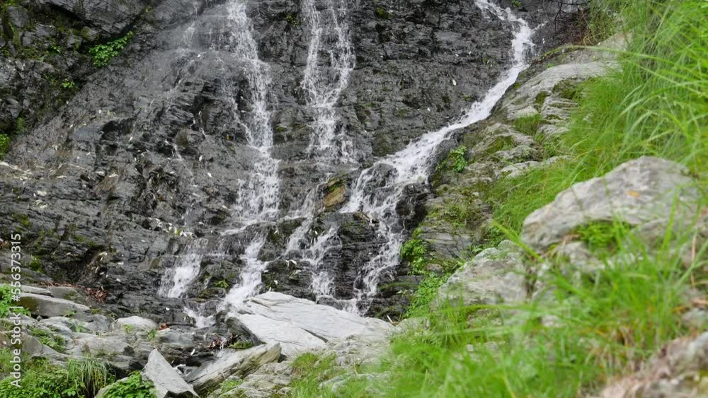 Beautiful waterfall in green forest. Small waterfall with crystal clear water. Tropical in mountain jungle. Stream running. Beautiful waterfall in green forest. Small waterfall with crystal clear water. Tropical in mountain jungle. Stream running.