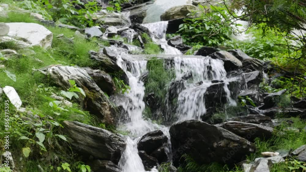 Beautiful waterfall in green forest. Small waterfall with crystal clear water. Tropical in mountain jungle. Stream running. Beautiful waterfall in green forest. Small waterfall with crystal clear water. Tropical in mountain jungle. Stream running.