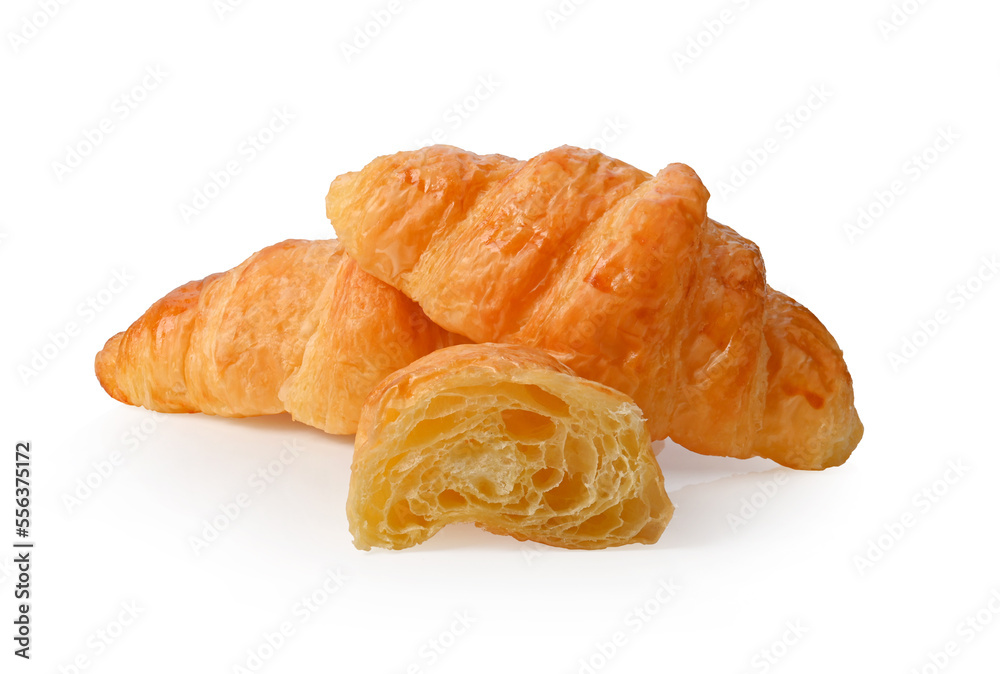 Golden brown butter croissant with shadow on the white background.