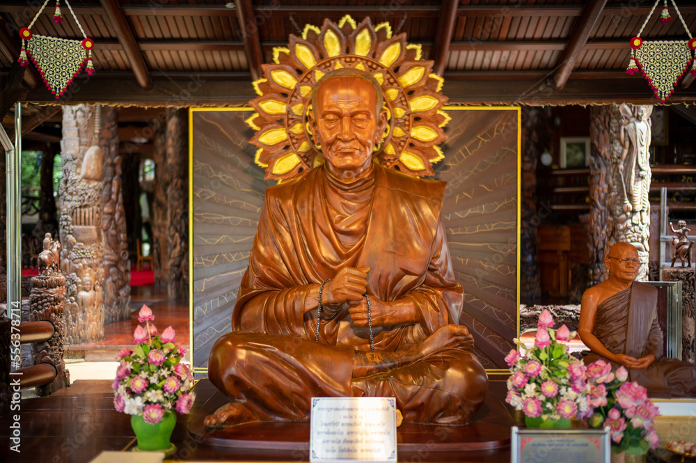 Bangkok, Thailand, August 21, 2022 :  Wat Sangkathan. Wooden Seated Somdej Phra Buddhacarya (Toh Brahmaramsi) Buddha image.