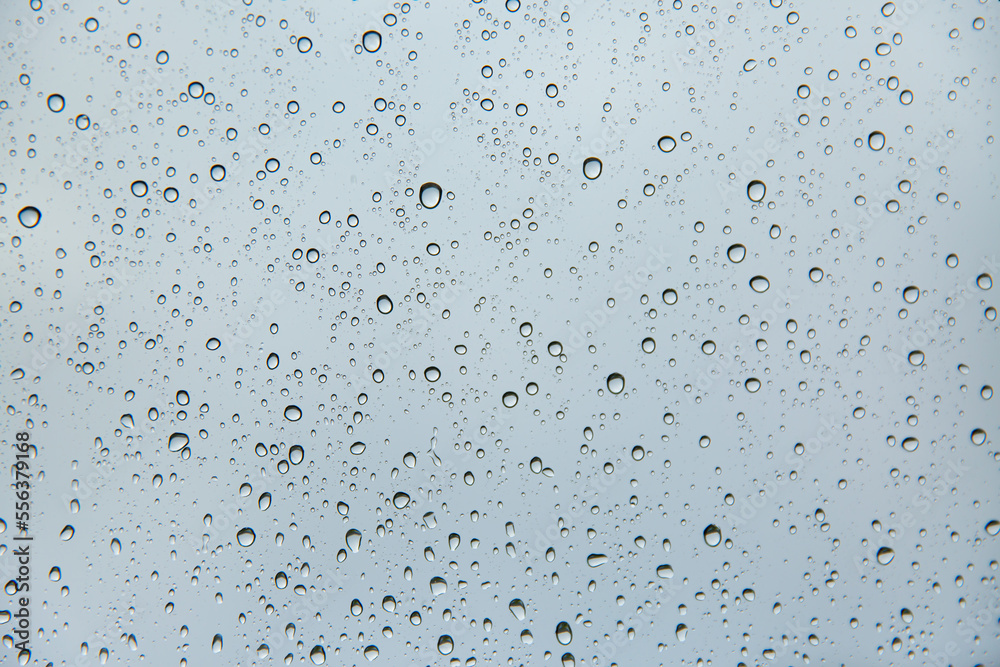 Water drops on car window glass