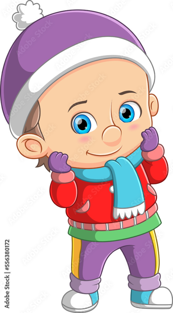 Cute boy Wearing red Winter Coat and purple Hat