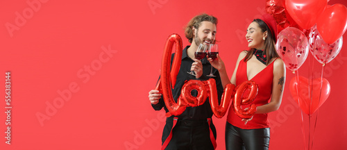 Happy young couple drinking...