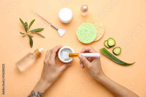 Female hands with jar of na...