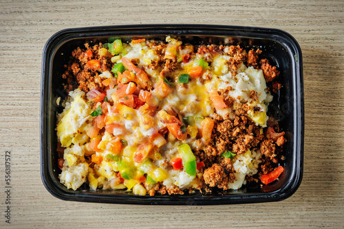 Delicious morning scramble meal on a to-go container