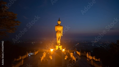 Aerial view Time Lapse of The Golden buddha in sunrise at Wat Phra That Kao Noi in Nan Province , Thailand. Time Lapse Sunrise Buddha and Sea of Fog