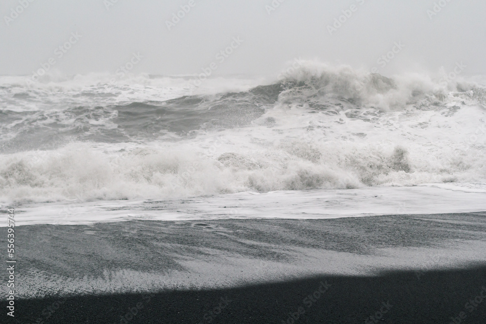 High waves breaking on coast monochrome landscape photo. Beautiful nature scenery photography with mist on background. Idyllic scene. High quality picture for wallpaper, travel blog, magazine, article High waves breaking on coast monochrome landscape photo. Beautiful nature scenery photography with mist on background. Idyllic scene. High quality picture for wallpaper, travel blog, magazine, article