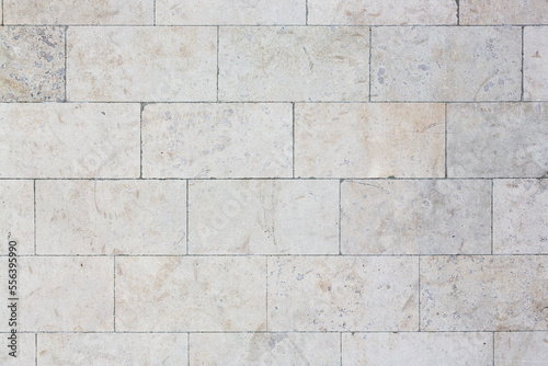 Wallpaper Mural Texture of a stone-tiled wall. Polished surface of masonry. Rock with a natural pattern. Vintage texture great for background and design. Torontodigital.ca