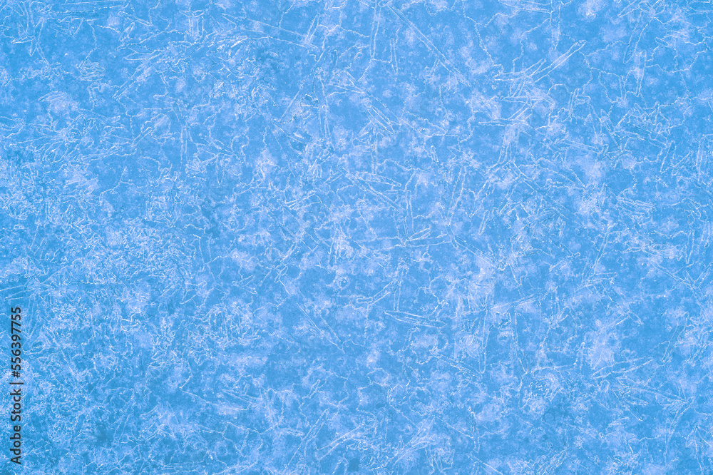 Pure blue ice in a luminous pattern of beautiful frost veins. Background concept