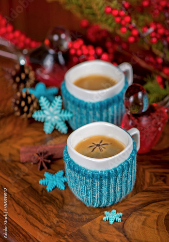 coffee with cardamom. winter drink. Coffee in cups with cardamom and white sugar on vintage wooden background