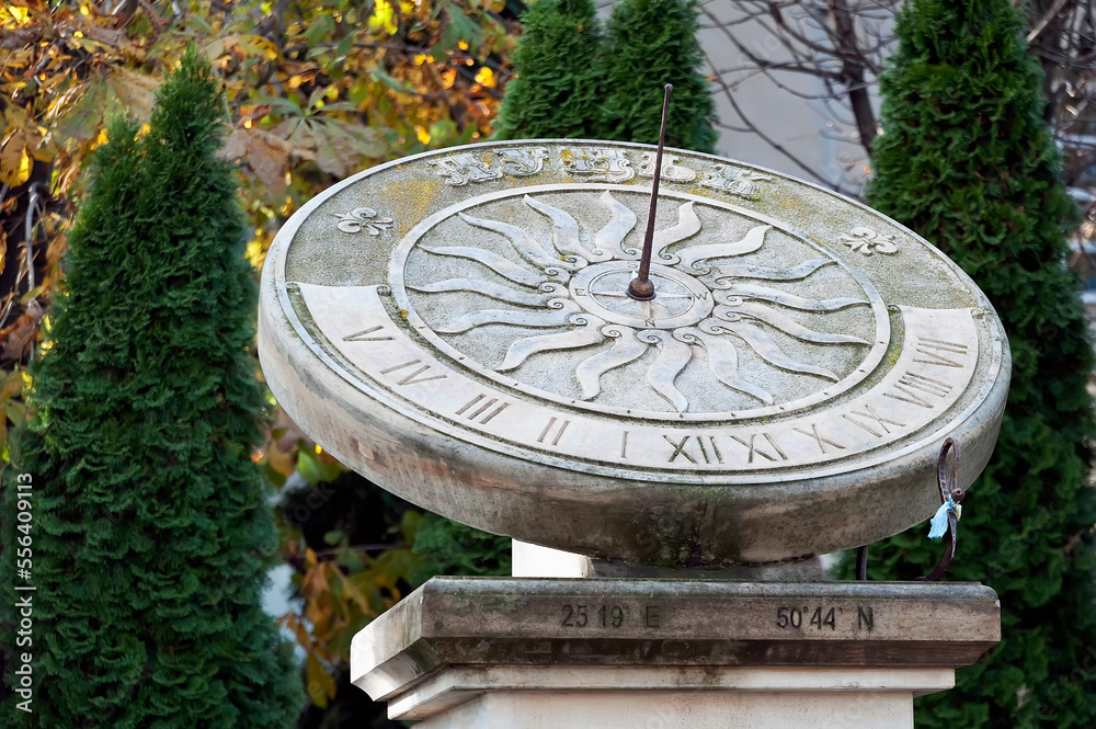 Closeup to the medieval sundial in Lutsk Ukraine. The upper text means Lutsk (city name) in English