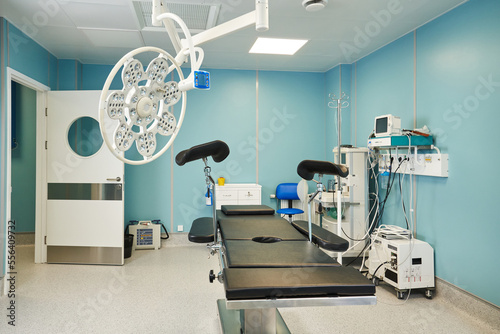 Fototapeta Naklejka Na Ścianę i Meble -  operating room with large operating light, resuscitation equipment and patient monitoring.