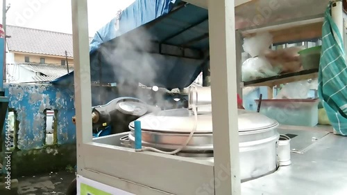 steam meatballs in the rombong of itinerant meatball vendors
