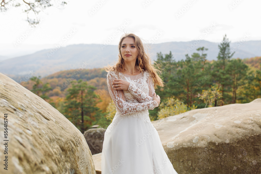Beautiful bride in white dress posing. Beautiful bride in white dress posing.