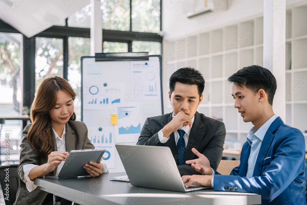 Group of Young Asian business team creative businesspeople coworker in office. Group of Young Asian business team creative businesspeople coworker in office.
