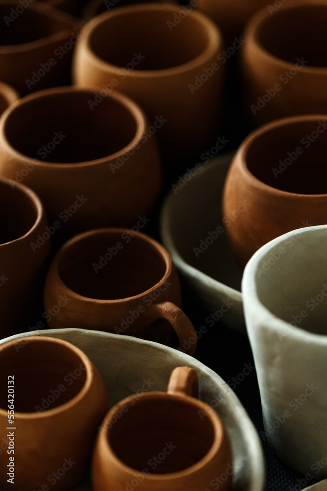 Handmade ceramic cups top view. Designer ceramic plates, bowls, cups and jugs Handmade ceramic cups top view. Designer ceramic plates, bowls, cups and jugs