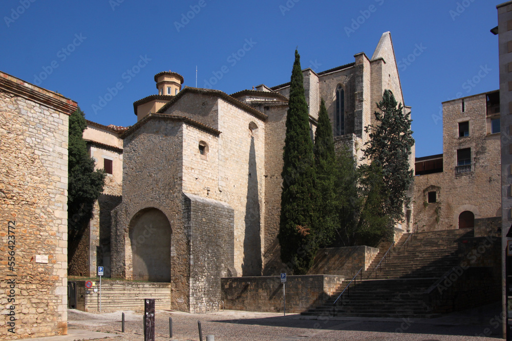 City square with stairs leading to St Domènec monastery with its gothic church in the old town of Girona, Catalonia region in Spain