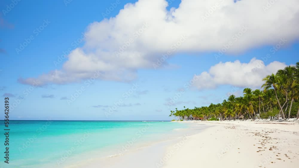 Beach landscape of the sea on the sand. Atlantic Ocean background. Caribbean sea and sky on a sunny day. Blue waves on white sand. Tropical nature. Walk on the sand of an exotic shore. Seascape. Beach landscape of the sea on the sand. Atlantic Ocean background. Caribbean sea and sky on a sunny day. Blue waves on white sand. Tropical nature. Walk on the sand of an exotic shore. Seascape.