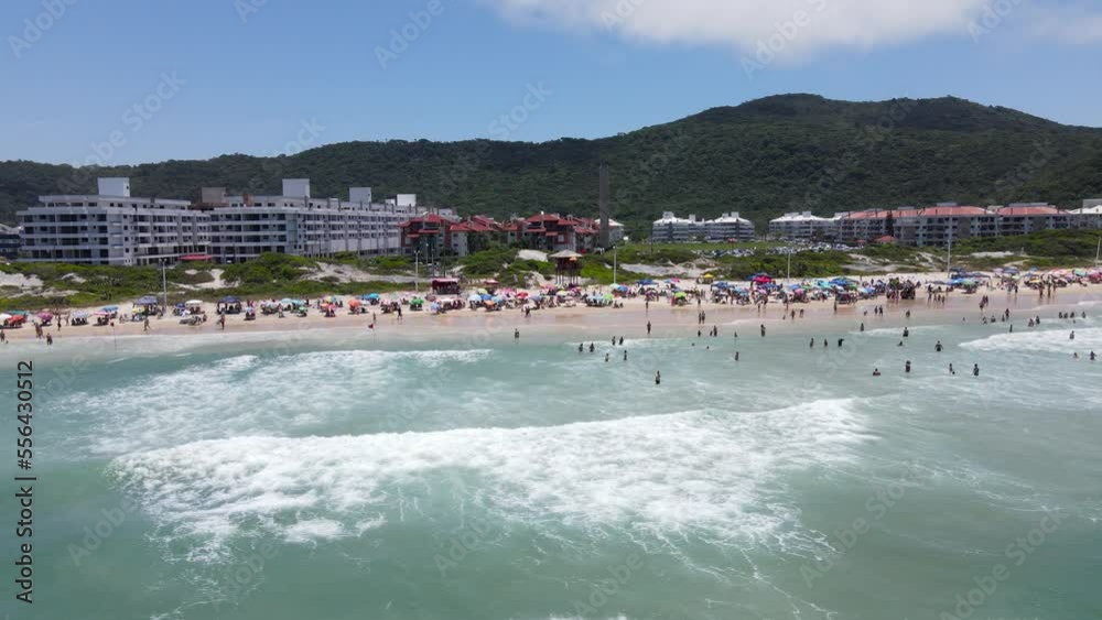 Aerial drone hight scene beach florianópolis seen from the top seaside town near the sea horizon buildings urban subdivision on the coast Ingles beach buildings facing the sea ingleses beach Aerial drone hight scene beach florianópolis seen from the top seaside town near the sea horizon buildings urban subdivision on the coast Ingles beach buildings facing the sea ingleses beach