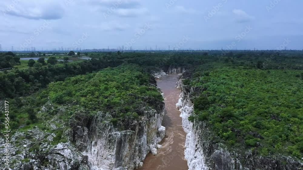 Flight Over The Narmada River Along The Marble Rocks At Bhedaghat In Jabalpur District, Madhya Pradesh, India. Aerial Shot Flight Over The Narmada River Along The Marble Rocks At Bhedaghat In Jabalpur District, Madhya Pradesh, India. Aerial Shot