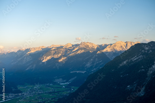 Austrian alps background in summer, popular travel destination, photo background. Summer sunset sunrise. Mountains' natural background, tourist destination