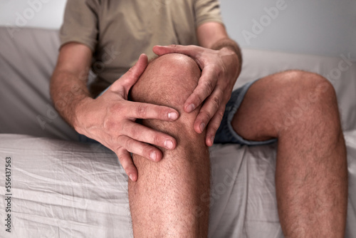 Adult male with knee pain, dislocation, numbness, cramp and other joint issues.