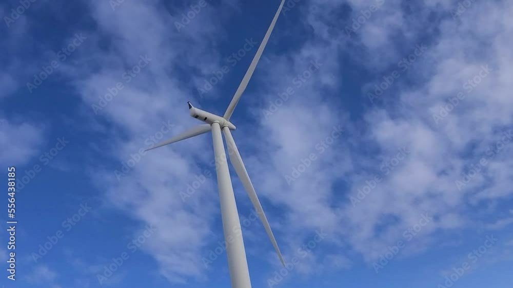 Driving under wind turbine as blades spin Driving under wind turbine as blades spin