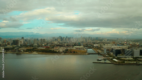 Cityscape of Makati, the business center of Manila, view from above. Asian metropolis at sunset. Travel vacation concept.