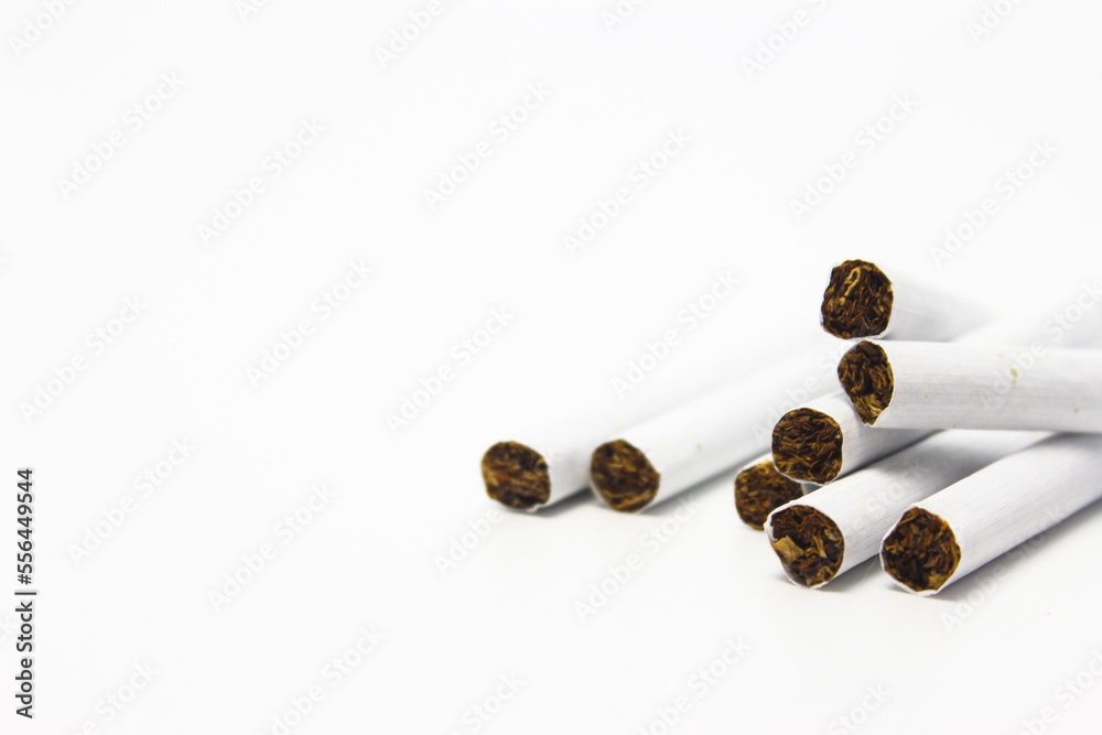 Cigarettes Isolated on a White Background. Left Copy Space Cigarettes Isolated on a White Background. Left Copy Space