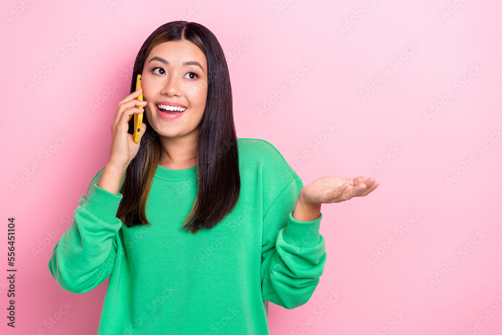 Photo of youngster korean positive talking woman business company owner communicate with customers remote phone isolated on pink color background Photo of youngster korean positive talking woman business company owner communicate with customers remote phone isolated on pink color background