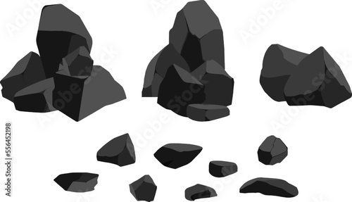 A set of black charcoal of various shapes.Collection of pieces of coal, graphite, basalt and anthracite. The concept of mining and ore in a mine.Rock fragments,boulders and building material.