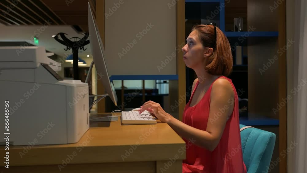 Caucasian woman typing text on computers keyboard at home. 4k footage UHD 3840x2160 Caucasian woman typing text on computers keyboard at home. 4k footage UHD 3840x2160