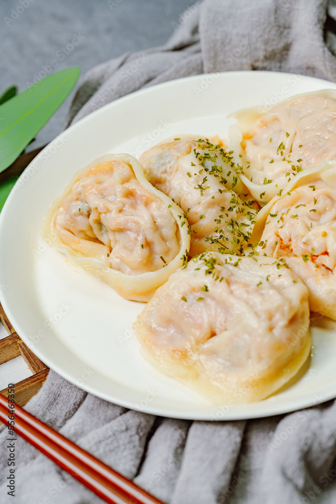 kimchimandu, Korean Kimchi dumpling : Kimchi dumplings are stuffed with a filling of chopped kimchi, bean curd, and vegetables. They are the most popular type of dumpling among Koreans. kimchimandu, Korean Kimchi dumpling : Kimchi dumplings are stuffed with a filling of chopped kimchi, bean curd, and vegetables. They are the most popular type of dumpling among Koreans.