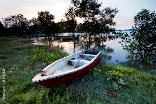 Boat at sunrise © Muhammad