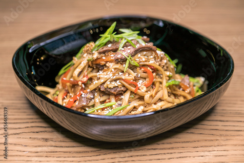 Restaurant dish homemade noodles with meat.