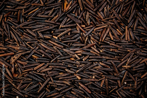 Macro photo of black rice background.