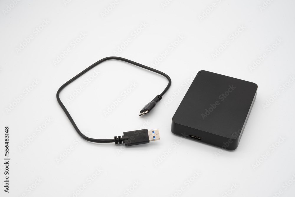 The black USB external hard disk for data transfer The black USB external hard disk for data transfer