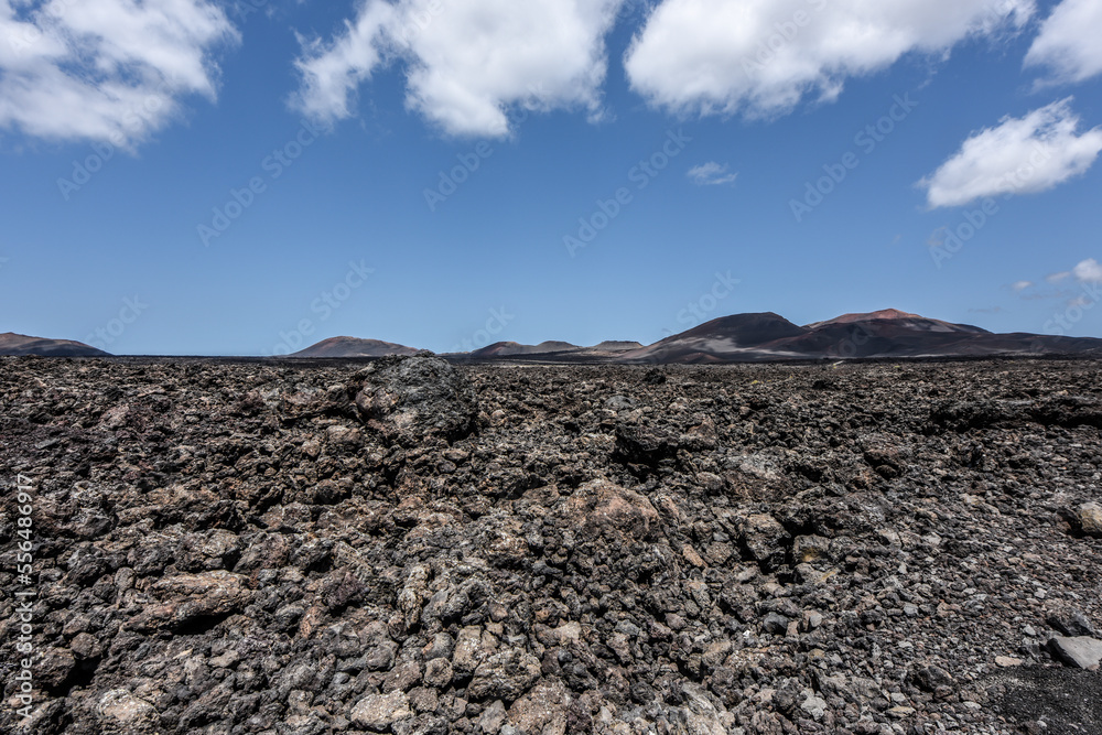 Bizarre volcanic landscape of Timanfaya National Park with black lava fields, Lanzarote, Canary Islands
