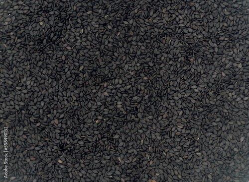 Black or dark sesame seeds or tils taken as use for plant background texture, Nutritious plant seeds for extracting into cooking oil © nathamag11