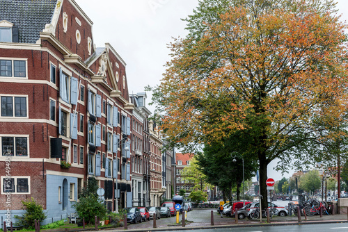 Photography Beautiful autumn street after rain in Amsterdam