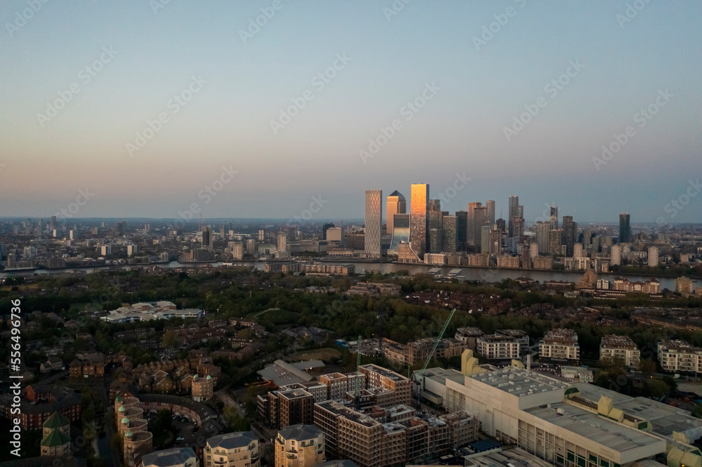 Elevated View of Canary Wharp and isle of Dog, London Skyline by sunset, London, UK