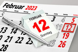 Deutscher Kalender und Datum Sonntag, 12. Februar 2023 mit Kugelschreiber