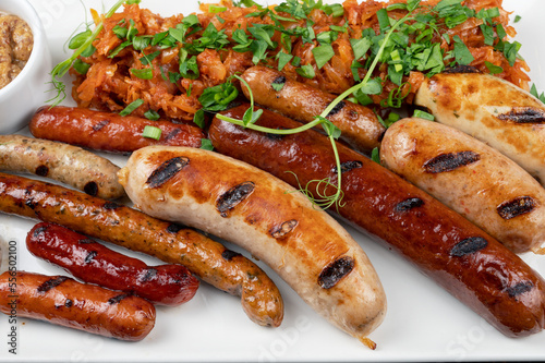 Grilled different sausage w...