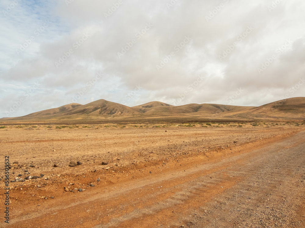 Fototapeta premium Mountains next to track in Fuerteventura