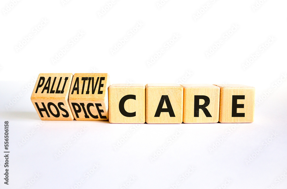 Palliative or hospice care symbol. Concept word Palliative care Hospice care on wooden cubes. Beautiful white table white background. Medical palliative or hospice care concept. Copy space. Palliative or hospice care symbol. Concept word Palliative care Hospice care on wooden cubes. Beautiful white table white background. Medical palliative or hospice care concept. Copy space.