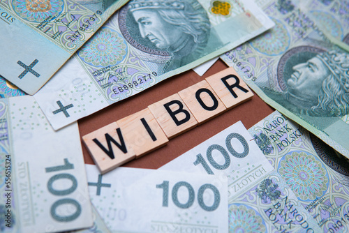 Inscription WIBOR next to polish money. WIBOR is Warsaw Interbank Offered Rate