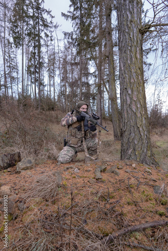 Member of the international legion - sniper protects the occupied territory of the territory. © Pavel