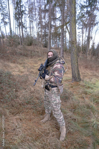 Member of the international legion - sniper protects the occupied territory of the territory.