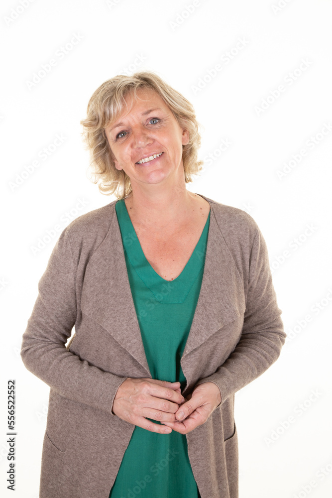 pretty middle age laughing senior woman casual in vest on white background pretty middle age laughing senior woman casual in vest on white background
