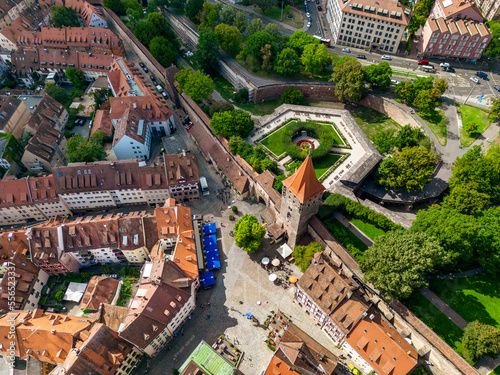 Aerial view of Tiergärtner torturm tower with the southern castle garden, the ancient city wall and medieval houses in the old city, Nuremberg , Germany